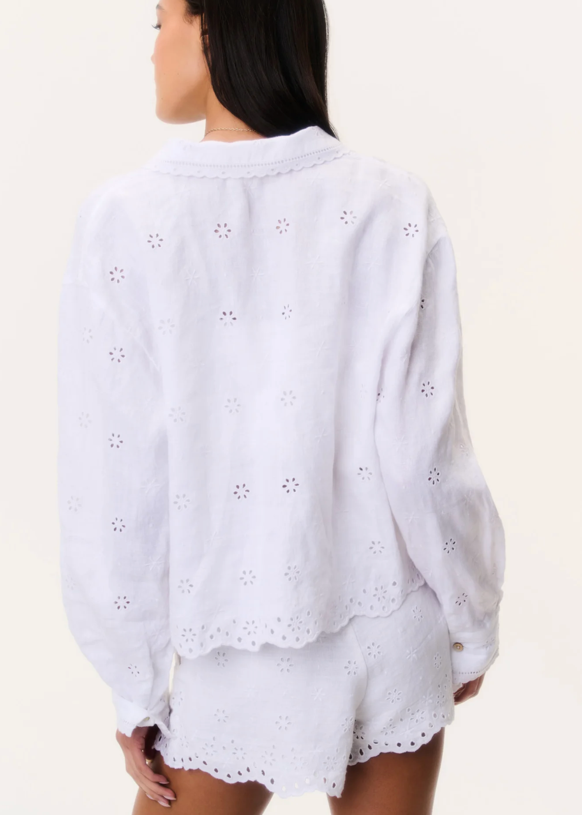 White embroidered top and shorts set on a white background