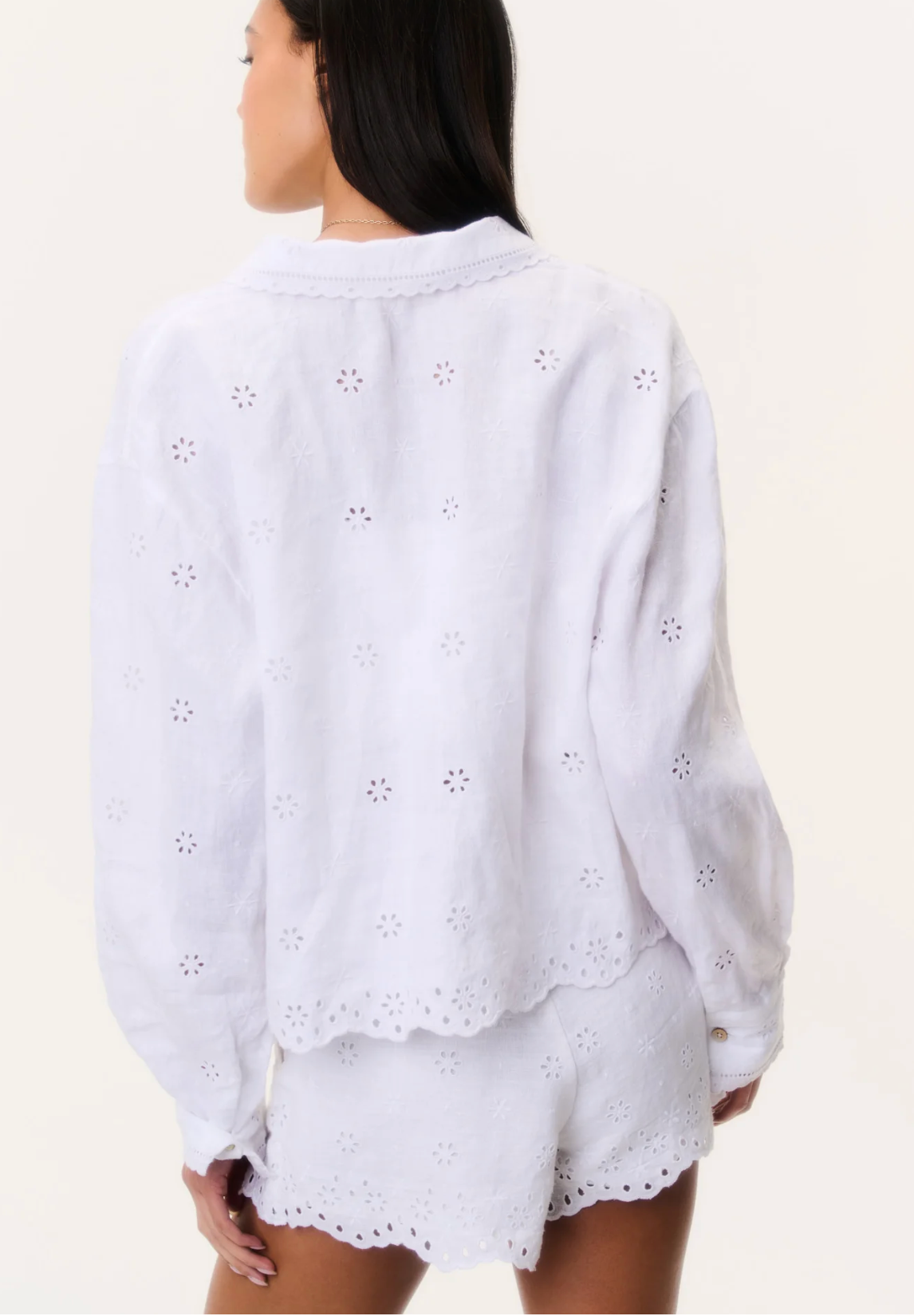 White embroidered top and shorts set on a white background