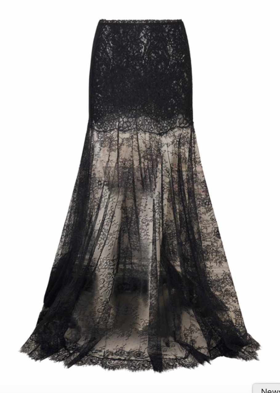 A black lace mermaid-style skirt with a fitted bodice and a sheer, flowing skirt that fades into a smoky sheer overlay, shown on a plain white background.