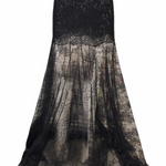 A black lace mermaid-style skirt with a fitted bodice and a sheer, flowing skirt that fades into a smoky sheer overlay, shown on a plain white background.