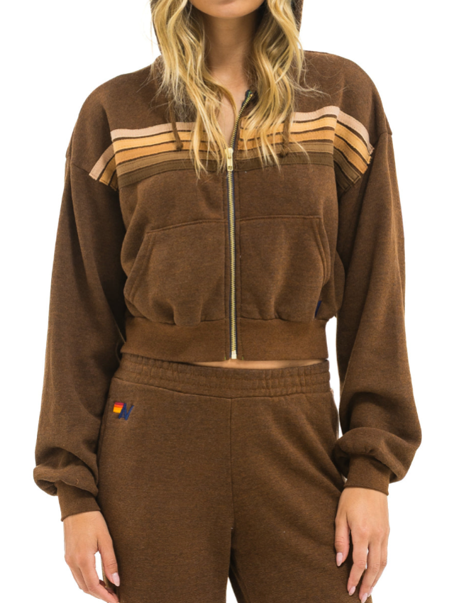 Brown tracksuit with a brand logo on a white background